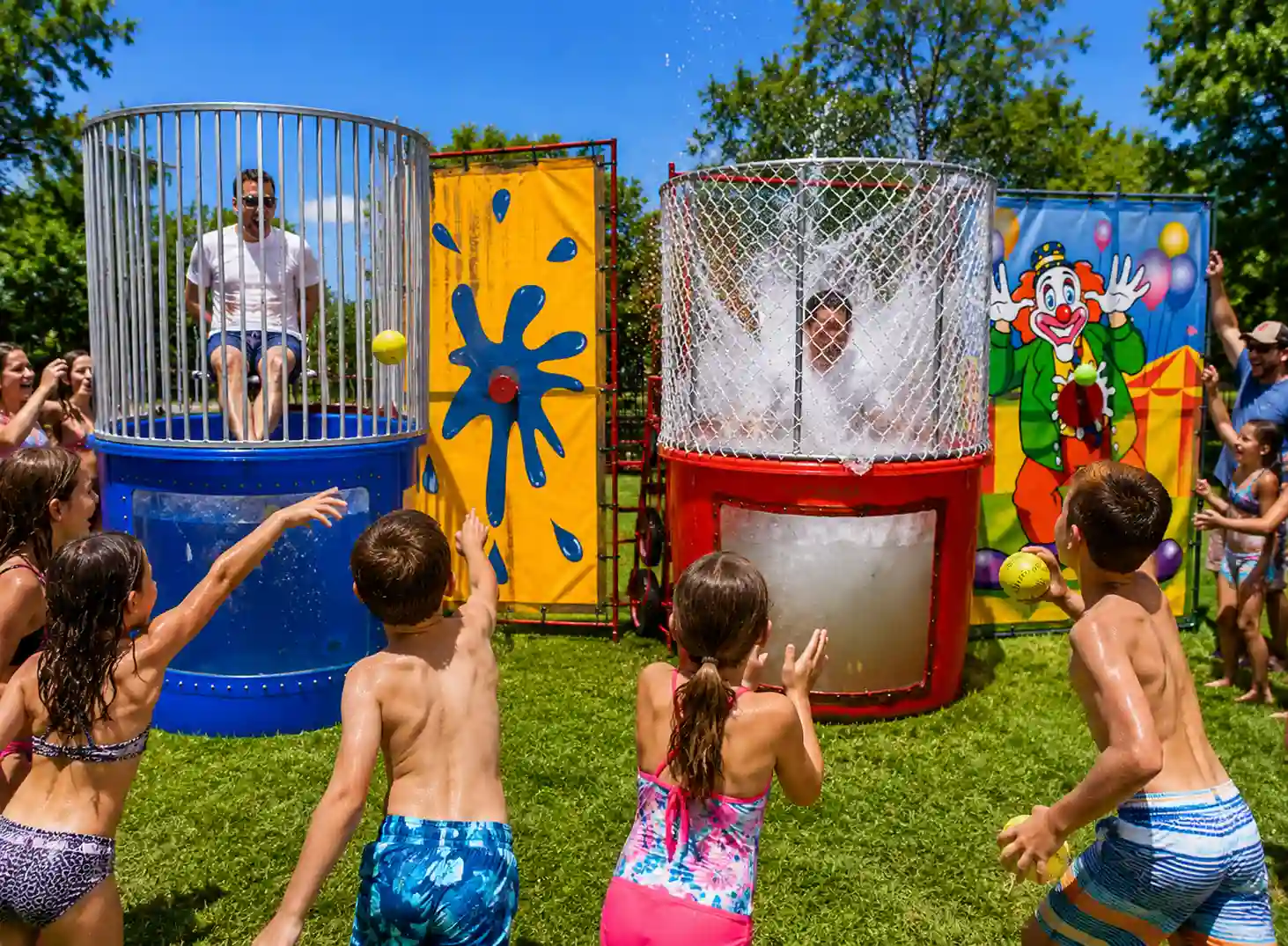 Kids throwing balls at a dunk tank at a Chicago outdoor event