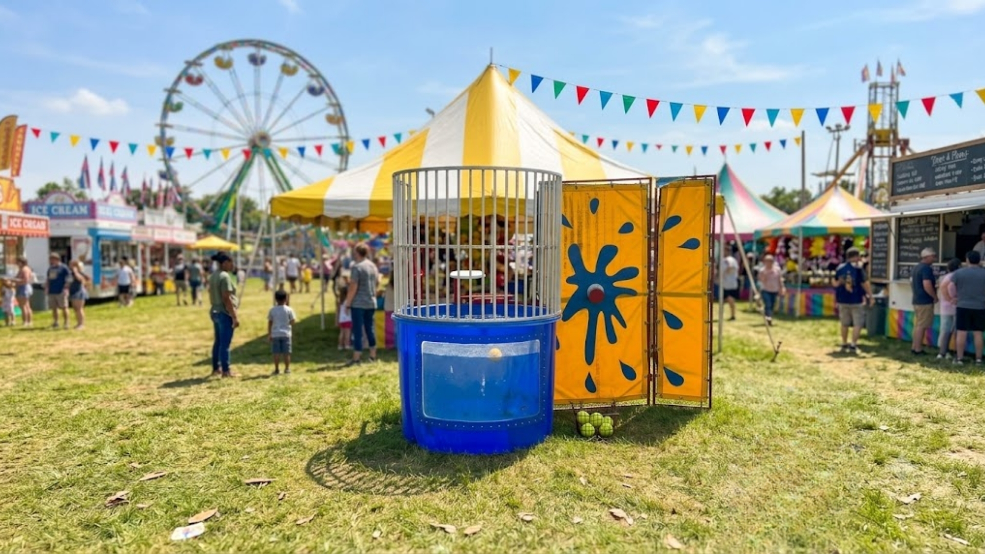 Blue and orange dunk tank at a busy Chicago community festival